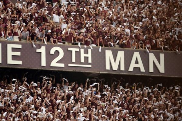 Sep 14, 2013; College Station, TX, USA; Texas A&M Aggies fans yell against the Alabama Crimson Tide during the first half at Kyle Field. Mandatory Credit: Thomas Campbell-USA TODAY Sports