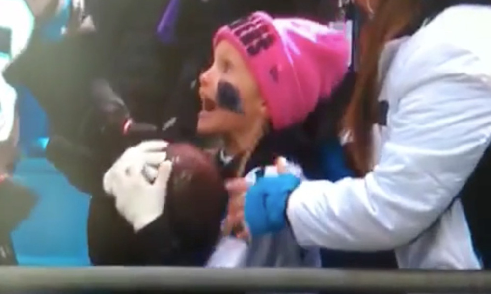 Watch this little girl go crazy after Panthers RB gives her a game ball