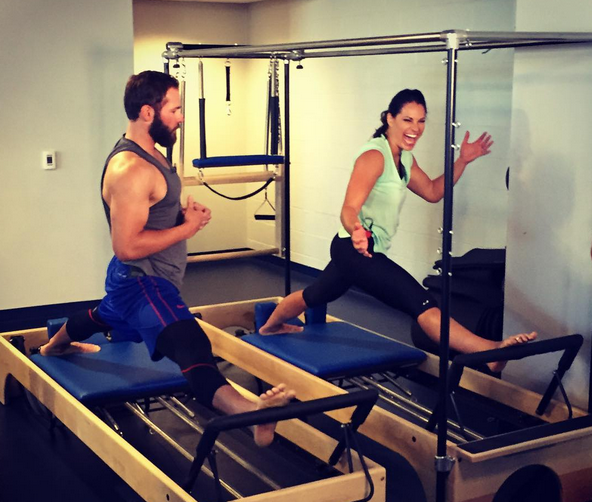 ESPN Baseball Analyst Jessica Mendoza takes a Pilates lesson from Cubs pitcher Jake Arrieta